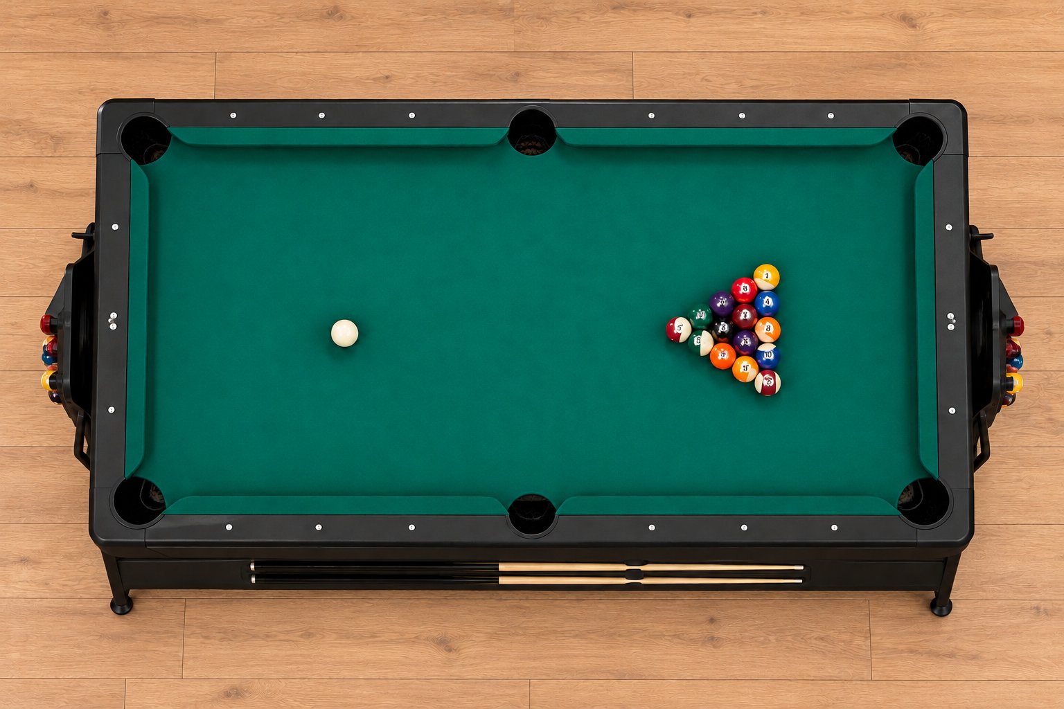 Overhead view of the convertible game table set for billiards with racked balls