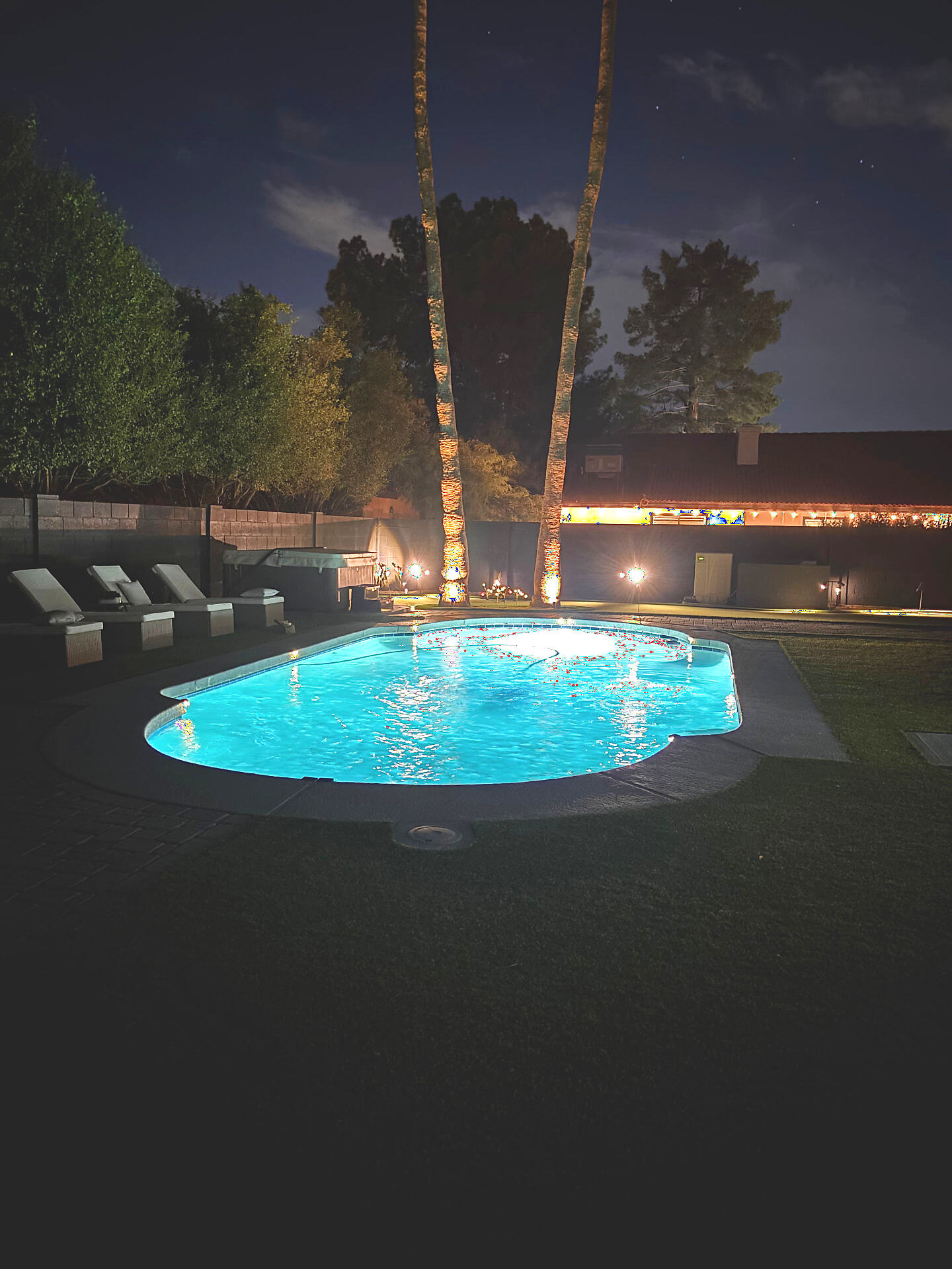 The private heated pool at The Rally House at night